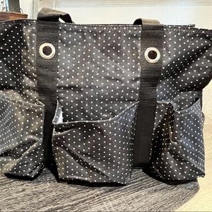 Thirty-one zippered utility tote.  Black with white polka dots.